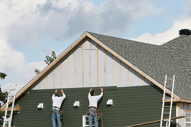 Professional Siding technician working in Locust, NC